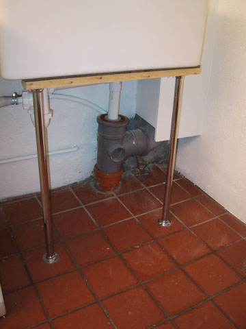 main water stop cock situated under the sink in the basement